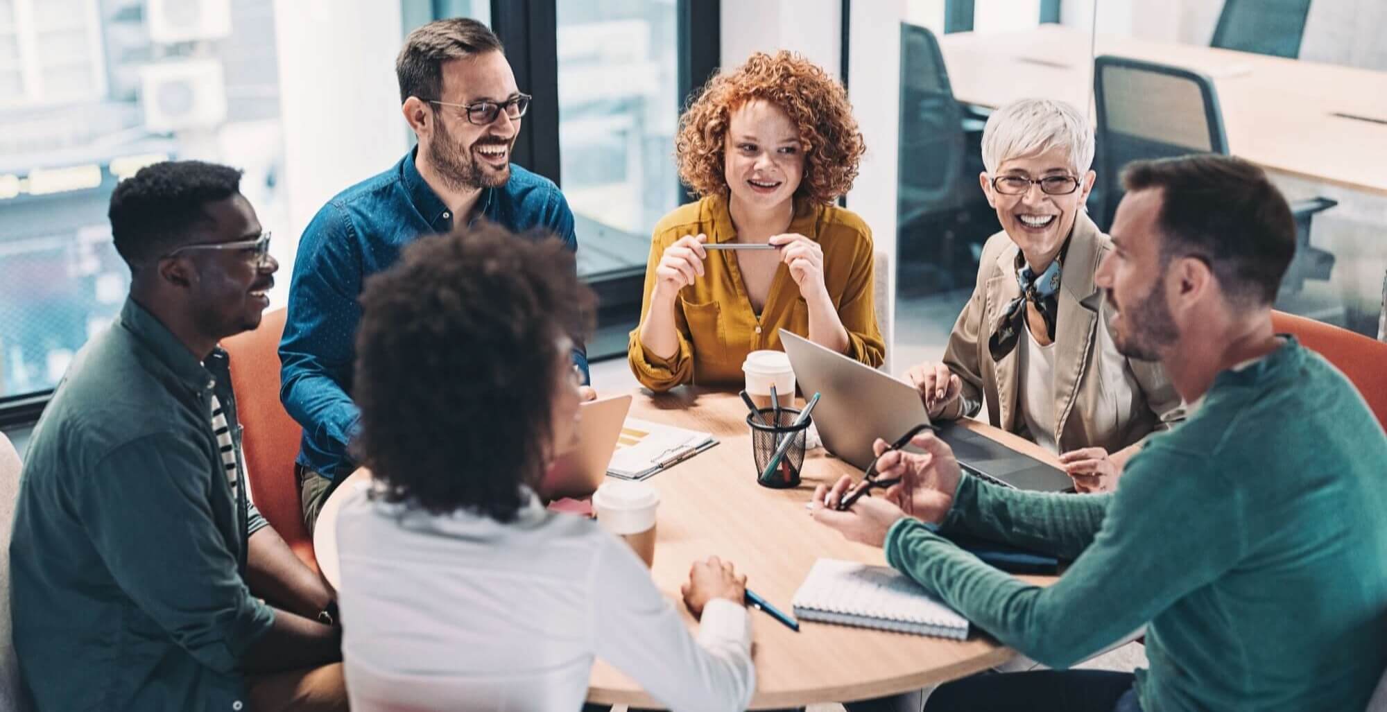CEP call for applications Academics in discussion around a table